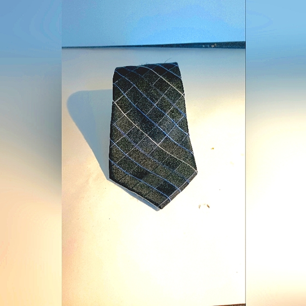 J. Ferrari 100 percent Silk tie. Black Blue and White. Sharp looking.